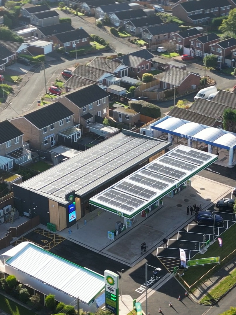 A bird's eye view of Swift Services Petrol Station, featuring commercial solar panels installed by Ingeni Renewables Limited.